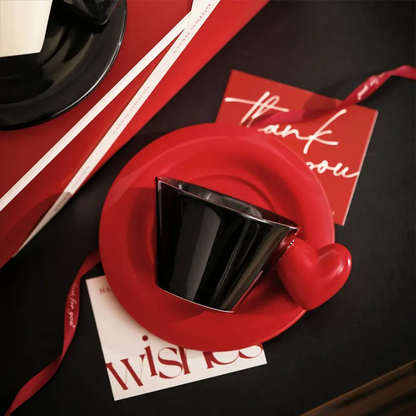 Monochrome Muse Duo – Artisan Heart-Handle Ceramic Cup & High-Gloss Saucer
