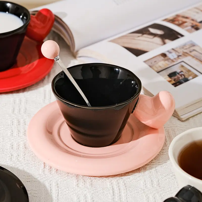 Monochrome Muse Duo – Artisan Heart-Handle Ceramic Cup & High-Gloss Saucer