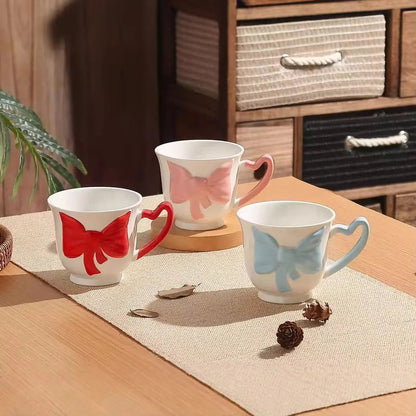 Amour Mug – Artisan 3D Bow Ceramic Cup & Sculptural Heart Handle