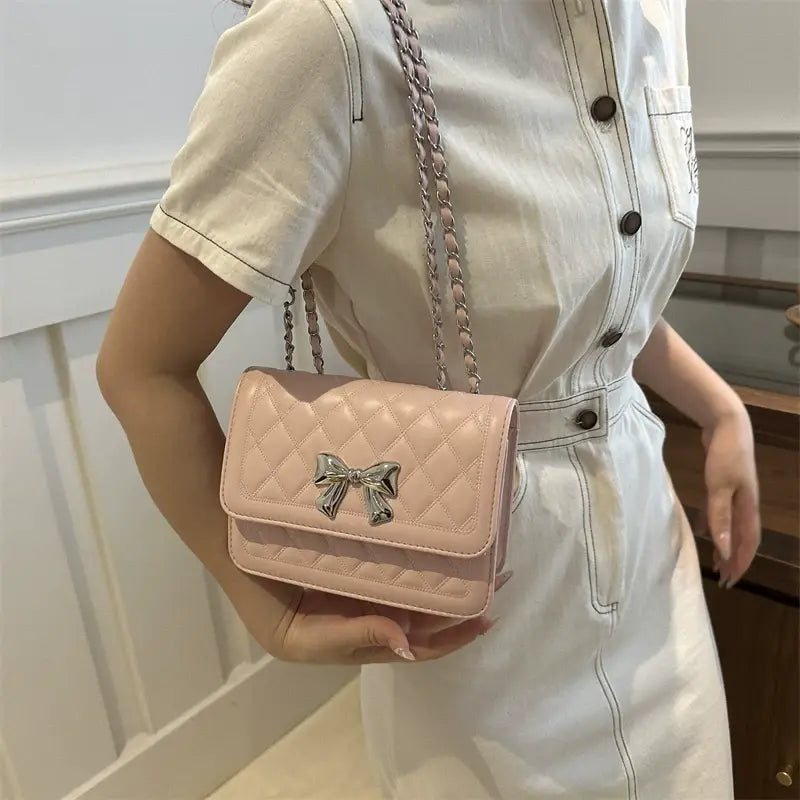 Lumiere Quilted Crossbody – Structured Diamond-Stitched Handbag with Metallic Bow Accent