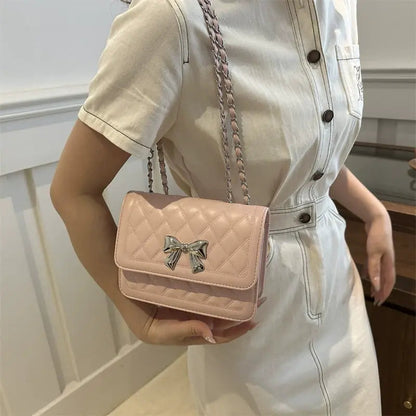 Lumiere Quilted Crossbody – Structured Diamond-Stitched Handbag with Metallic Bow Accent