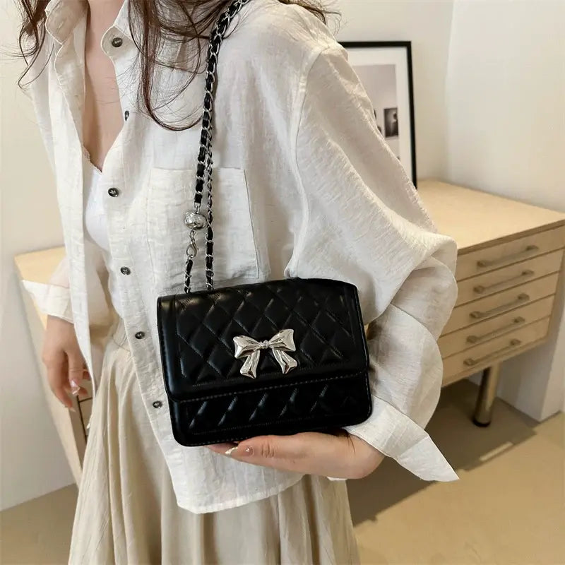 Lumiere Quilted Crossbody – Structured Diamond-Stitched Handbag with Metallic Bow Accent