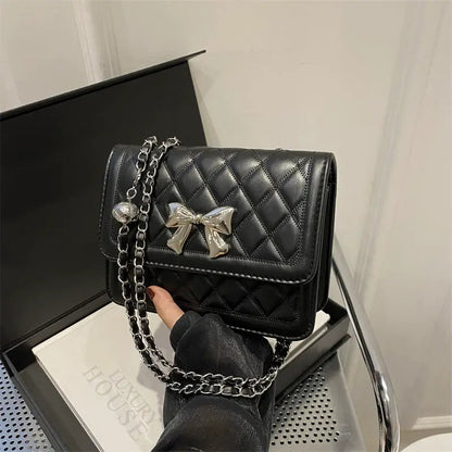 Lumiere Quilted Crossbody – Structured Diamond-Stitched Handbag with Metallic Bow Accent