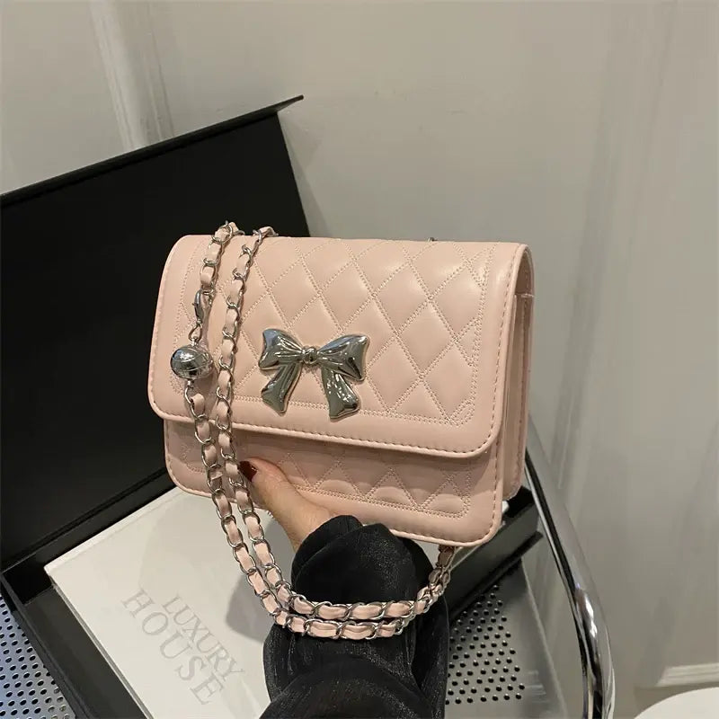Lumiere Quilted Crossbody – Structured Diamond-Stitched Handbag with Metallic Bow Accent