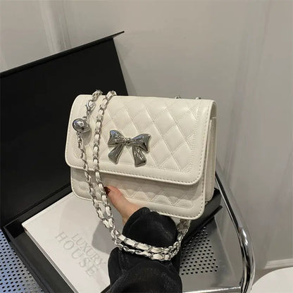 Lumiere Quilted Crossbody – Structured Diamond-Stitched Handbag with Metallic Bow Accent